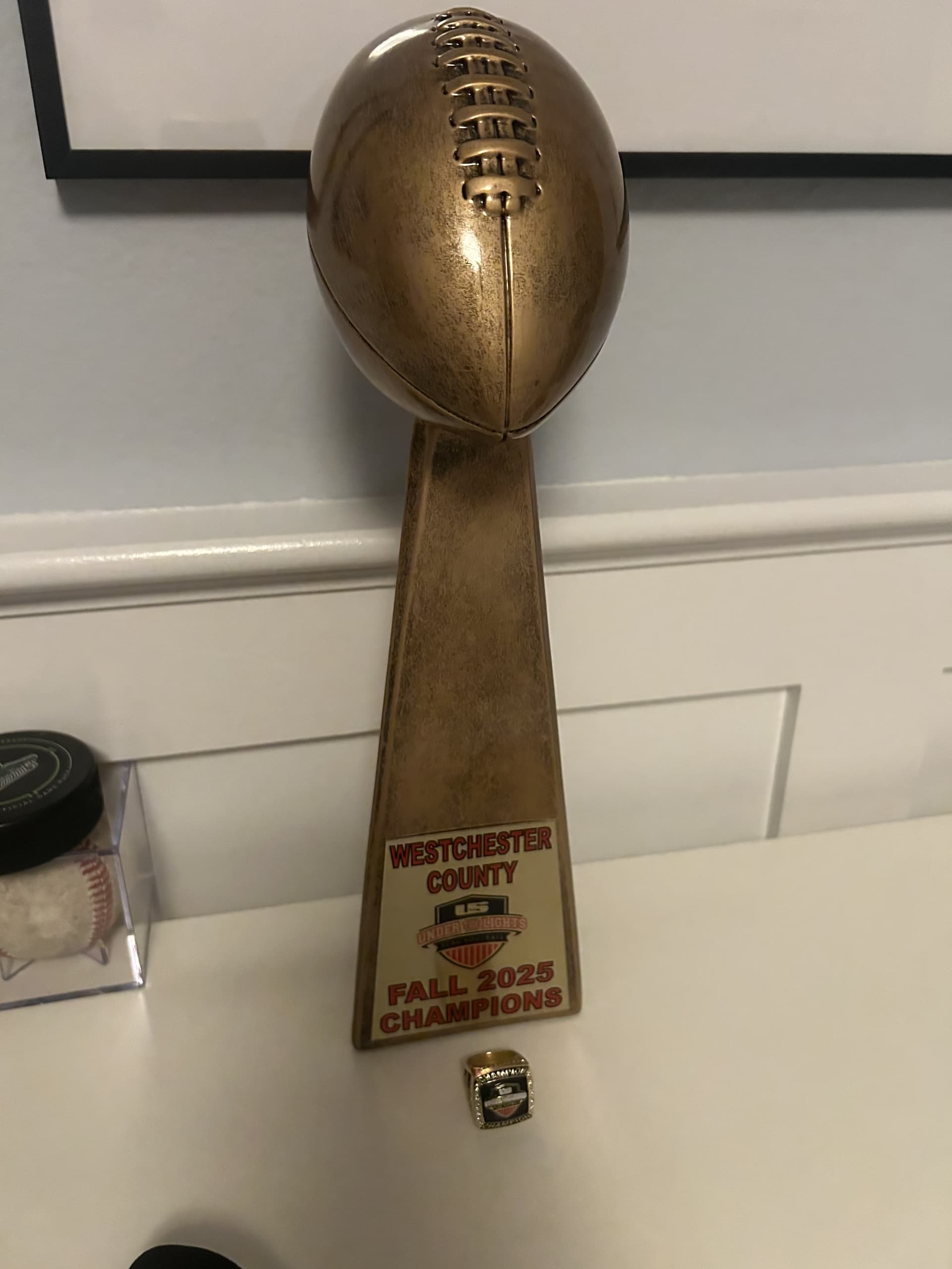 Westchester County Fall 2025 Flag Football Champions trophy and ring.